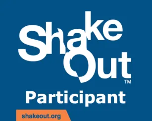 Blue background, white letters spelling Shake Out Participant.