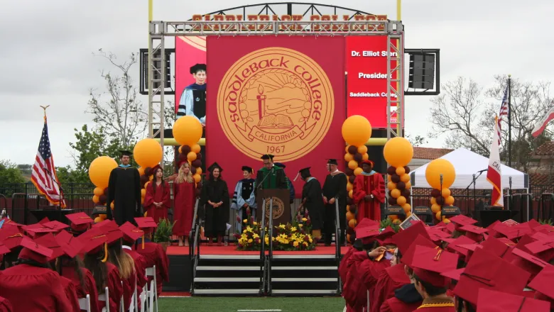 Commencement graduates listening to Dr. Stern remarks