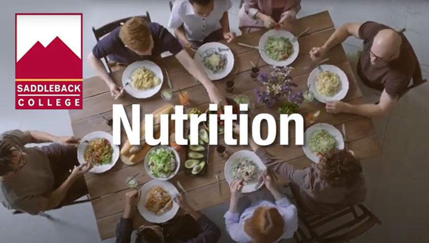 An overhead view of people sitting around a table sharing a meal with the word "Nutrition" imposed over it.